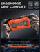 Hands holding the Mumba Titan case for Nintendo Switch 2 in orange, with a rear view and grip profile detail.