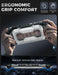 Hands holding the Mumba Titan case for Nintendo Switch 2 in silver, with a rear view and grip profile detail.