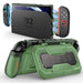 Mumba Titan case for Nintendo Switch 2 in Urban green, shown with the console in a dock and the rear card-holder stand open.